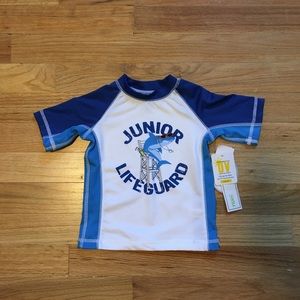 NWT boy’s rash guard swim top.